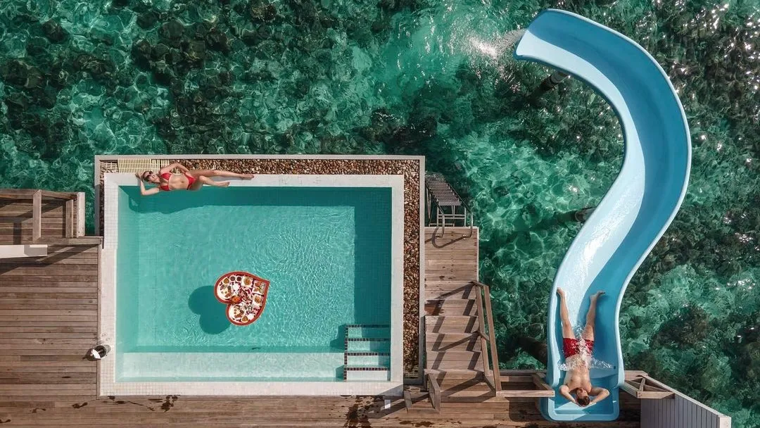 Pool with slide at Siyam World